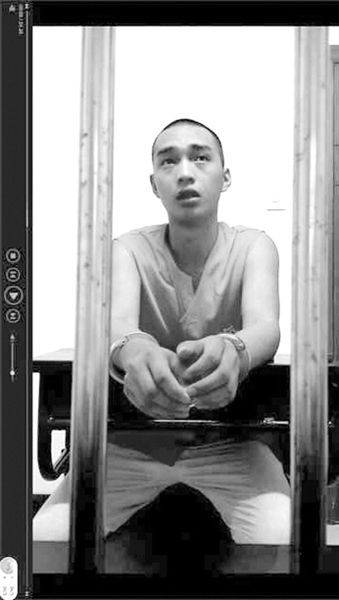 在看守所里的陳明燦。視頻截圖