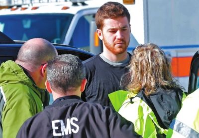 嫌犯接受詢問(wèn)。新華社/美聯(lián)