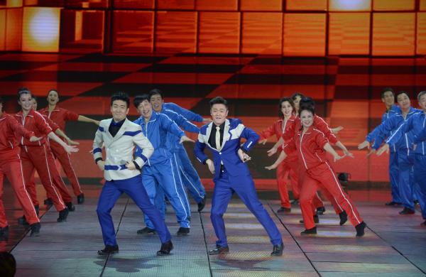 《小蘋果》、《最炫民族風》等廣場舞曲將會有全國統(tǒng)一、編排科學、帶給人正能量的全新動作。 CFP 資料