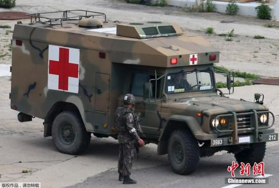 資料圖：當(dāng)?shù)貢r間2014年6月23日，韓國江原道哨所槍擊事件肇事士兵林某已被抓獲