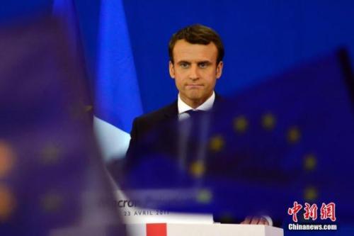 圖為馬克龍?jiān)趹c祝集會上。中新社記者 龍劍武 攝