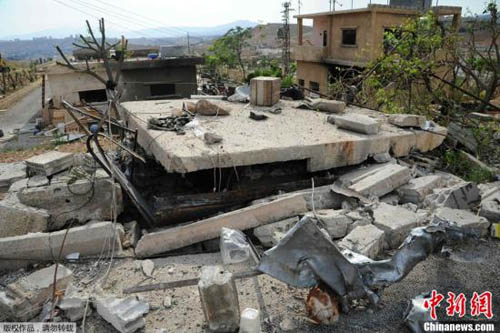 資料圖：當(dāng)?shù)貢r間5月5日凌晨。以色列對3處敘利亞軍事場所進(jìn)行空襲，造成平民傷亡和大規(guī)模破壞，空襲威脅